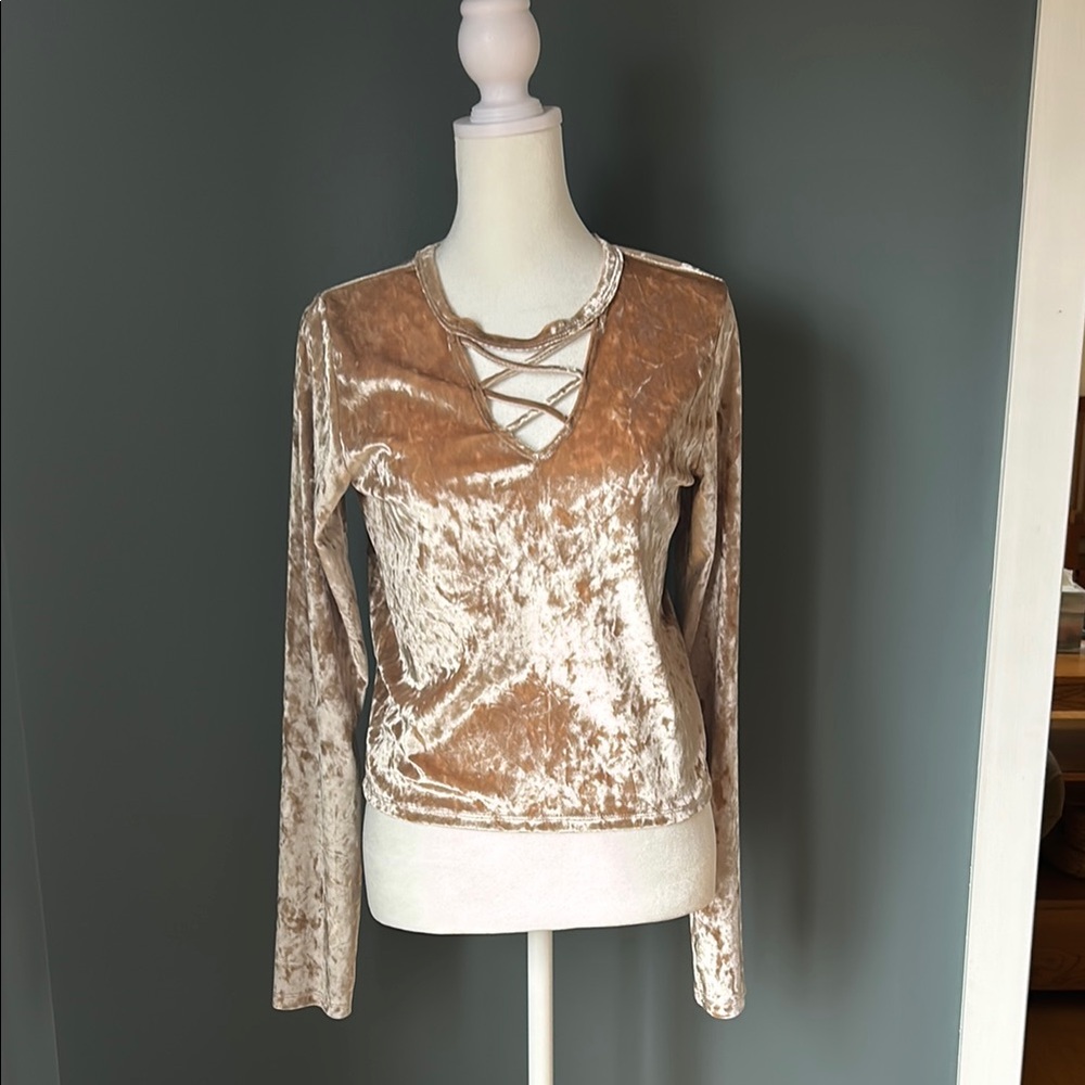 Cream Long Sleeve Blouse with Plunge Neckline and Cut Out Detail